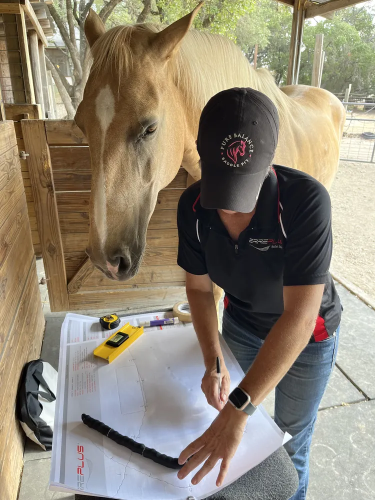 Susan McGinnis taking a back template during an on-site saddle fitting